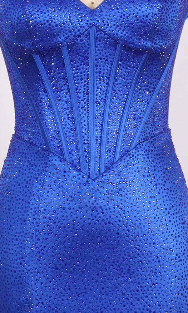 Close-up of the Long Prom Dress: PromGirl Exclusive 250224, a blue stretch satin halter gown with rhinestone accents, corset bodice, and vertical seam details for a structured fit.
